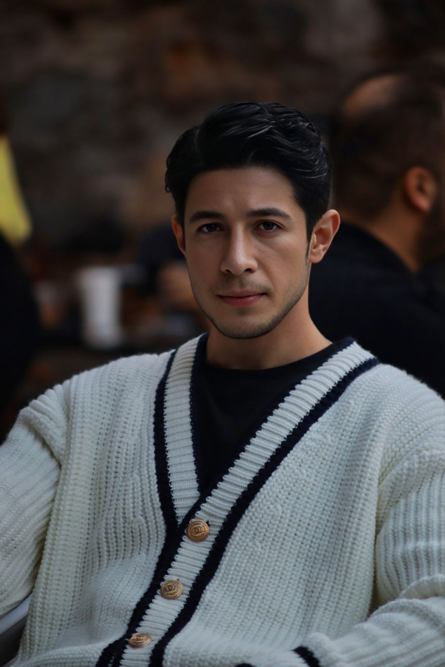 The Cardigan-as-Shirt Phenomenon: Why Buttoning Only the Top Has Become the New Uniform