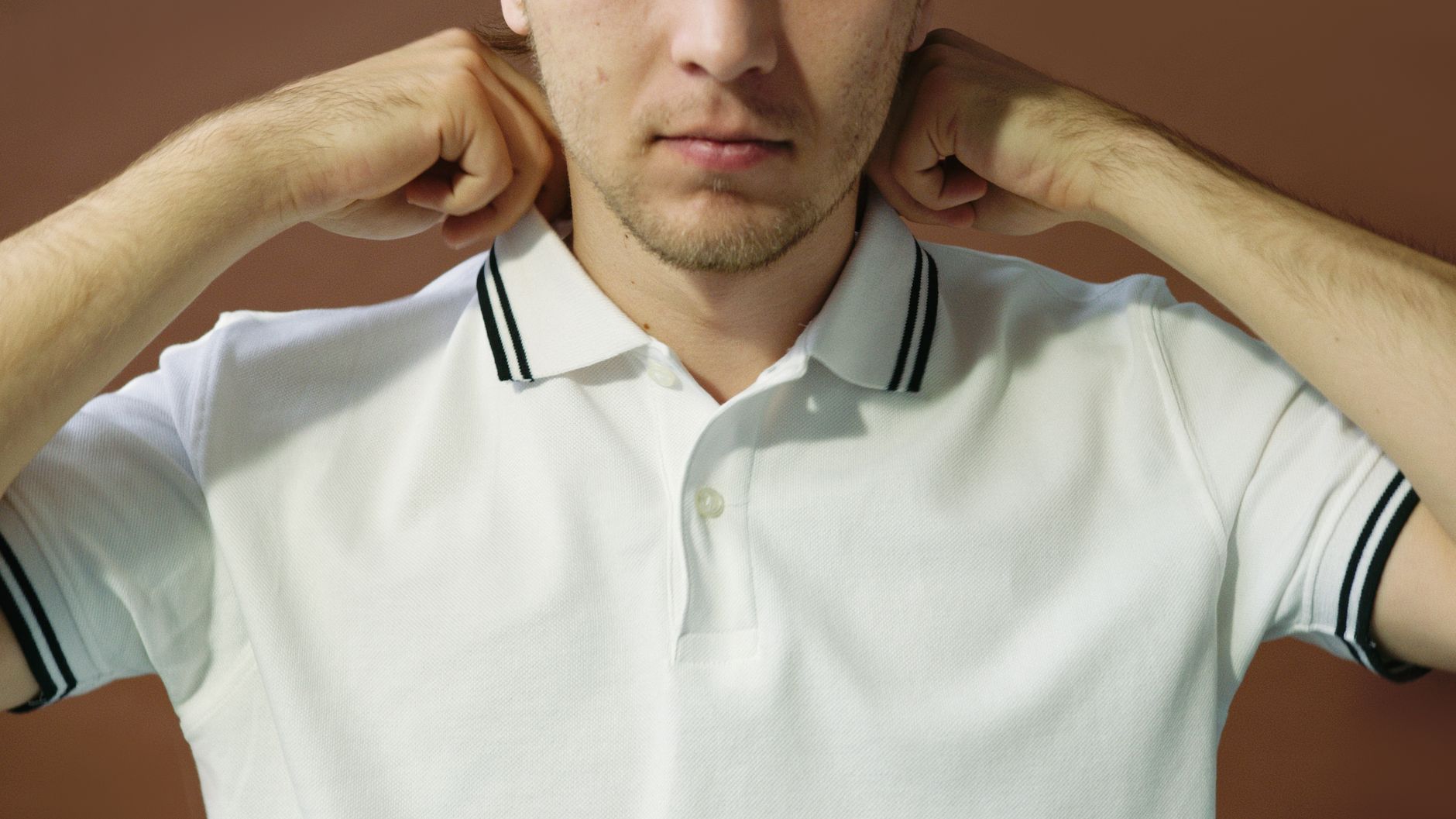 The Collar Disappeared Entirely: When Necklines Became Raw Edges and Crews Got Cut Off